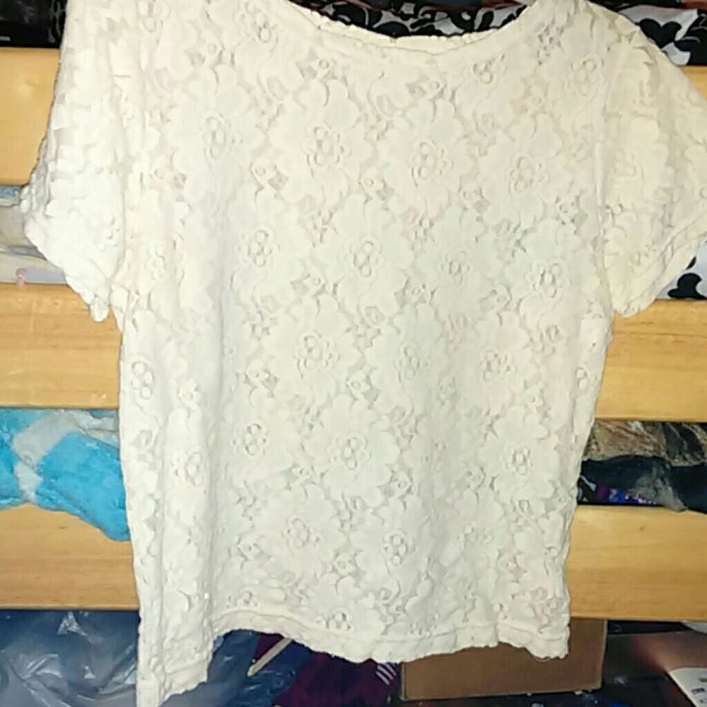 A lacey cute white shirt top